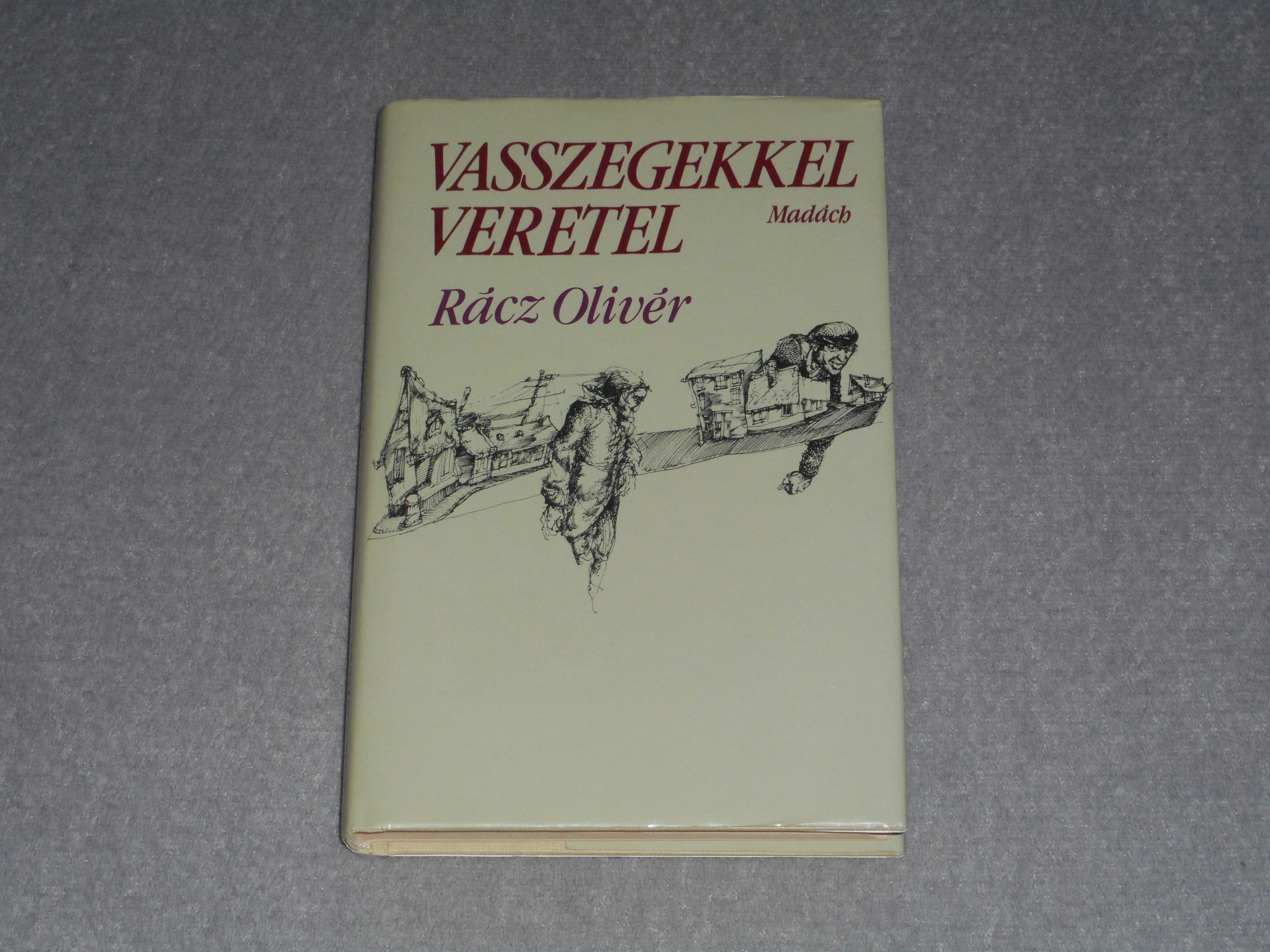 Rácz Olivér - Vasszegekkel ​veretel